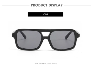 Front view of black square sunglasses with double nose bridge and grey lenses