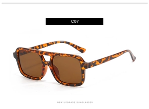 Detail of retro tortoiseshell square sunglasses with double bridge and brown lenses