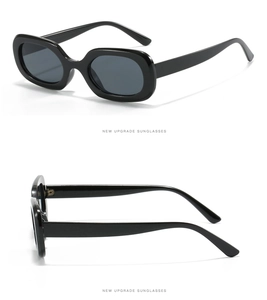 Zwei Ansichten der schwarzen ovalen Sonnenbrille mit breiten Bügeln und Gläsern