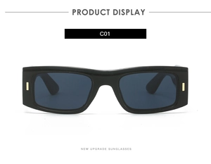 Détail de lunettes de soleil rectangulaires noires avec des accents en métal doré