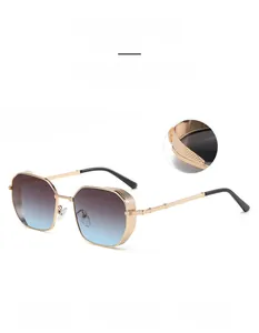 Detailed close-up of steampunk gold metal sunglasses frame with mesh side shields and blue lens