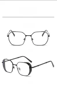Detail view of vintage polygonal metal sunglasses with intricate mesh hinge decoration