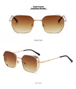 Detail of gold metal frame sunglasses with engraved temples and gradient tea lenses