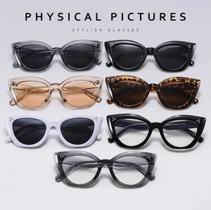Detail showing various cat eye sunglasses frames with silver triple-stud accents