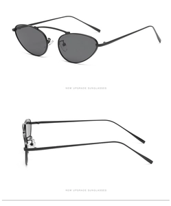 Detail view of oval punk sunglasses with black metal frame and double bridge design