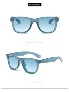Details der blauen quadratischen Sonnenbrille mit Silbernieten und Verlaufsgläsern