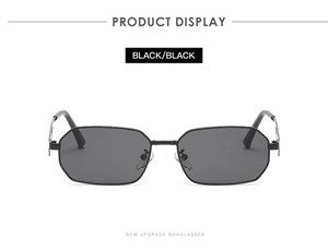 Detailed front view of black metal sunglasses featuring unique octagonal geometric lenses