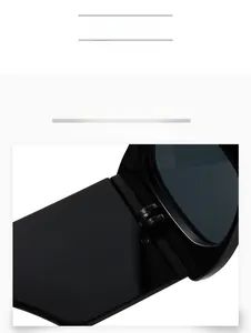 Vue détaillée en gros plan de la charnière solide sur des lunettes de soleil noires