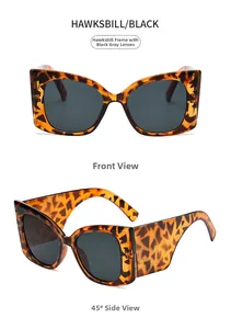 Détail des lunettes de soleil oversize écaille avec branches larges et verres gris