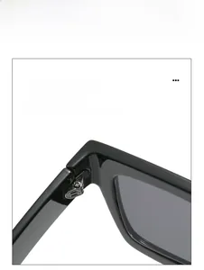 Detail of durable metal hinges and polished black frame on square sunglasses