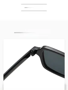 Close-up of the robust metal hinge and sleek black square frame of the sunglasses