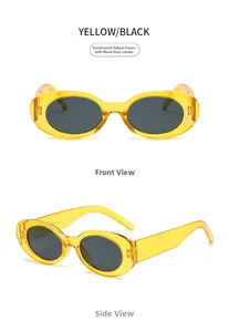 Detail view of oval sunglasses with transparent yellow frames and dark grey lenses