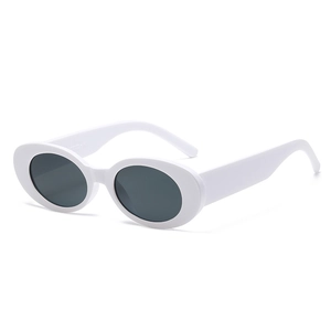 Vintage oval sunglasses with white wide frame and dark lenses in Y2K retro style