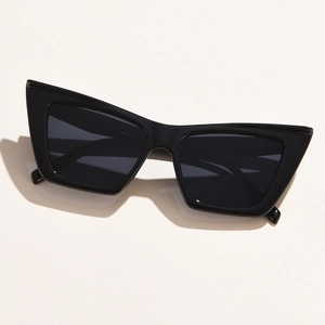 Classic black cat-eye sunglasses with thick glossy frames and dark lenses in a retro style