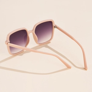 Detailed side view of pink square oversized sunglasses with gradient purple lenses