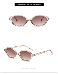 Detail view of champagne oval sunglasses with gradient brown lenses and transparent frame