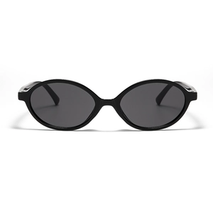 Retro small oval black sunglasses with dark lenses for men and women minimalist style