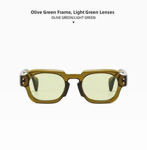 Detail of olive green translucent frame sunglasses with light green lenses and metal rivets
