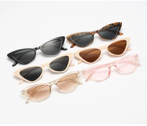 Cat eye sunglasses detail in six assorted colors including tortoiseshell and beige frames