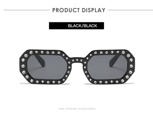 Front view of small polygon sunglasses with crystal rhinestones on black frame