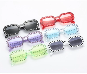 Detail view of colorful crystal rhinestones on rectangular frames in multiple colors