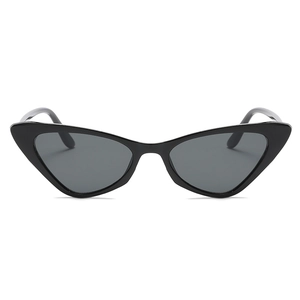 Classic black cat-eye sunglasses with dark lenses for a retro chic minimalist look
