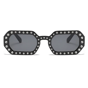 Fashionable small frame sunglasses with rhinestones and black frames for women in street style