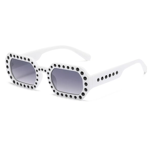 White octagon frame sunglasses with black rhinestone accents and gradient lenses