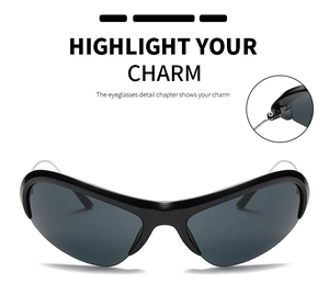Detail of Y2K wraparound sunglasses showing durable frame hinges and sleek black design