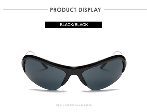 Close-up of sleek black Y2K wraparound sunglasses with glossy finish and modern sporty design