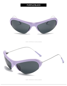 Detail of purple Y2K sunglasses with streamlined frame and sleek metal temples