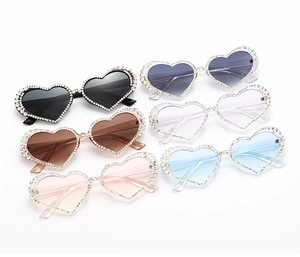 Collection of heart-shaped sunglasses with shimmering AB rhinestones in six various colors
