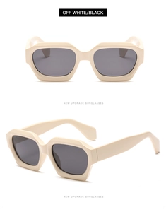 Front and side views of chunky off-white hexagonal sunglasses with dark grey lenses