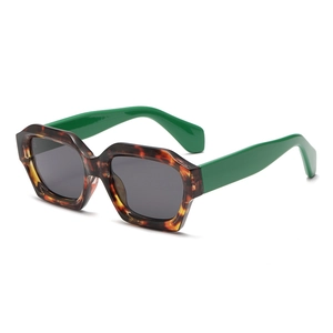 Vintage hexagon sunglasses with tortoiseshell frame and contrast green temples