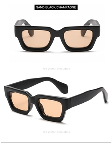 Detail view of vintage square sunglasses with sand black frames and champagne lenses