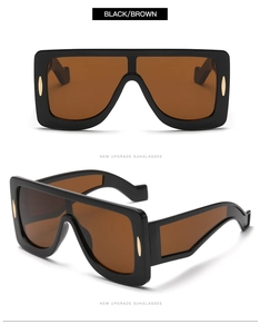 Detailed views of retro oversized square sunglasses with black frame and brown lenses
