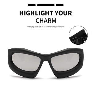 Detail view of matte black Y2K sports sunglasses hinge and thick frame construction