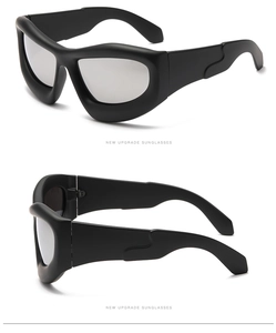 Detail view of matte black Y2K sunglasses with silver mirrored lenses and thick frame