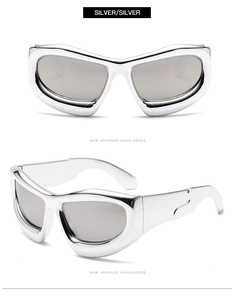 Close-up of Y2K futuristic wrap-around silver sunglasses with thick streamlined frames