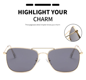 Détail de la charnière en métal doré et du double pont des lunettes de soleil carrées