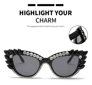 Close-up of cat-eye sunglasses featuring detailed rhinestone and gemstone embellishments
