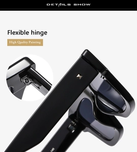 Detail show of flexible metal hinges and silver rivets on glossy black sunglasses