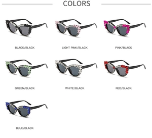 Multi-colored cat-eye sunglasses with rhinestone embellishments in various frame shades