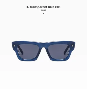 Close-up of transparent blue square sunglasses with silver rivets and grey lenses