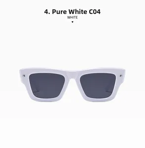 Detail showing solid white thick frame sunglasses with decorative silver metal studs