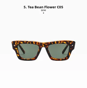 Detail view of square tortoiseshell sunglasses with dark green lenses and demi finish