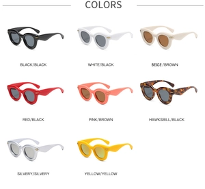 Detail view of oval retro sunglasses showing eight vibrant color options and metal rivets