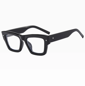 Detailed view of thick black square frames with silver studs and anti-blue light lenses