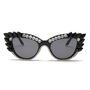 Fashion cat eye sunglasses for women with black and white rhinestones and grey lenses