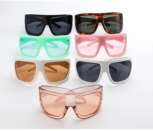 Detailed collection of oversized retro sunglasses showing seven varied frame and lens colors